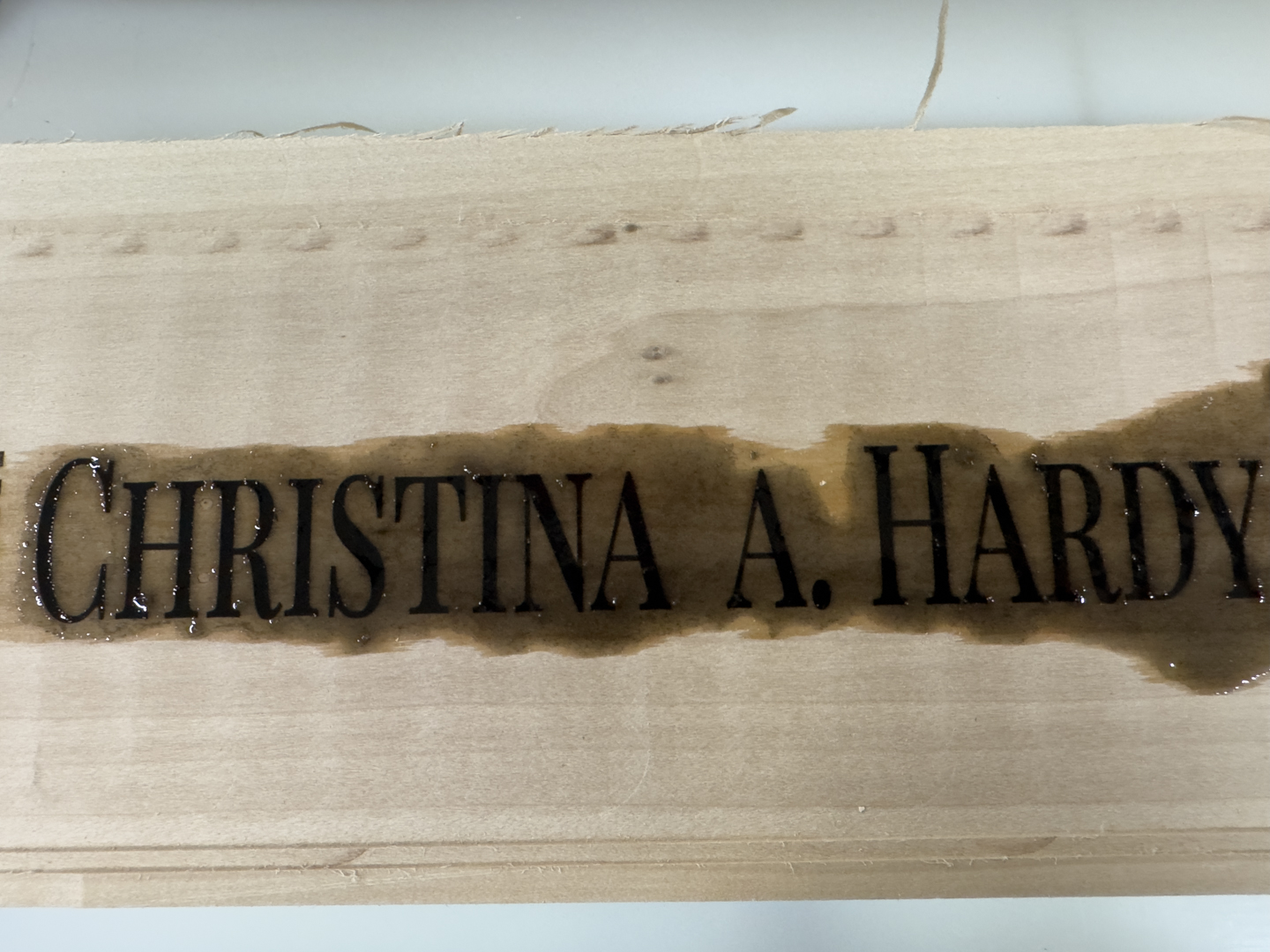 Custom wood nameplate with glossy epoxy lettering Custom wood nameplate with glossy epoxy lettering