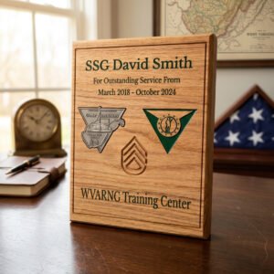 Military service award plaques in wood, with engraved rank insignia and service dates