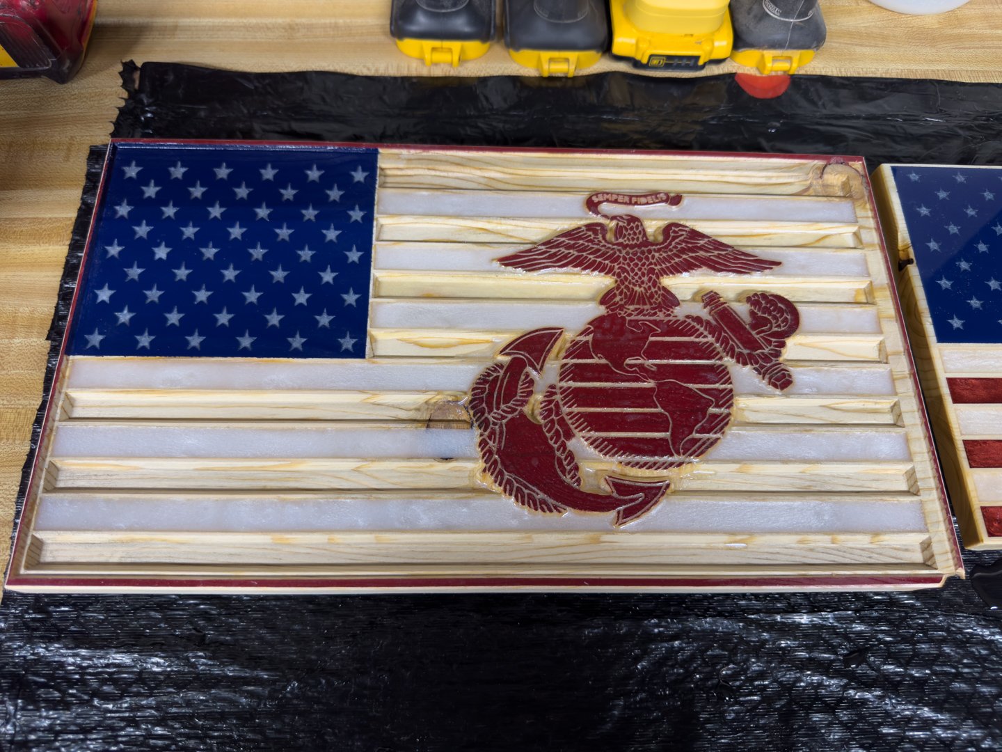 Wood epoxy American flag wall art with red and white stripes, blue star field, and a Marine Corps emblem
