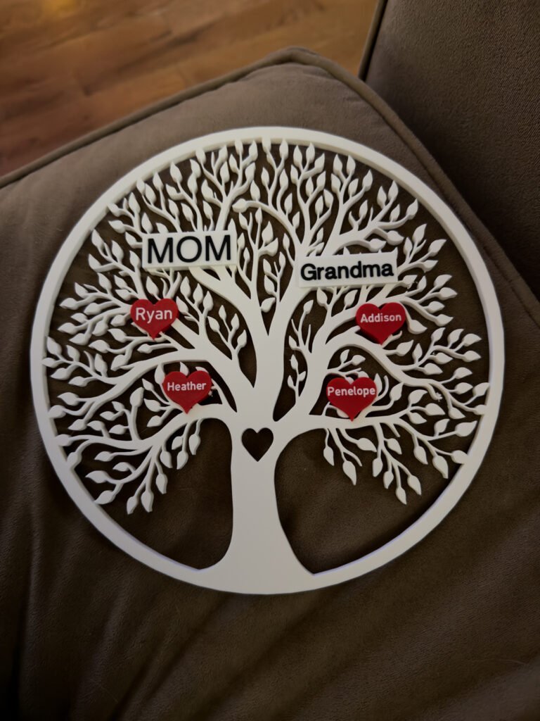 Printed white frame for a personalized family tree of life suncatcher before resin is added