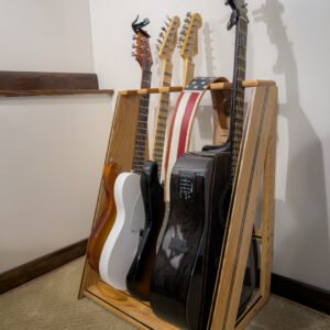 Handmade multi guitar display rack holding acoustic and electric guitars upright